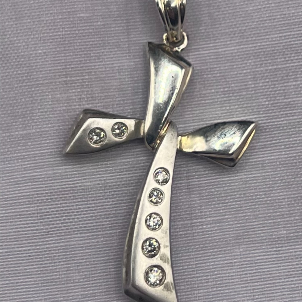 14k Gold Cross Pendant with small dimonds.